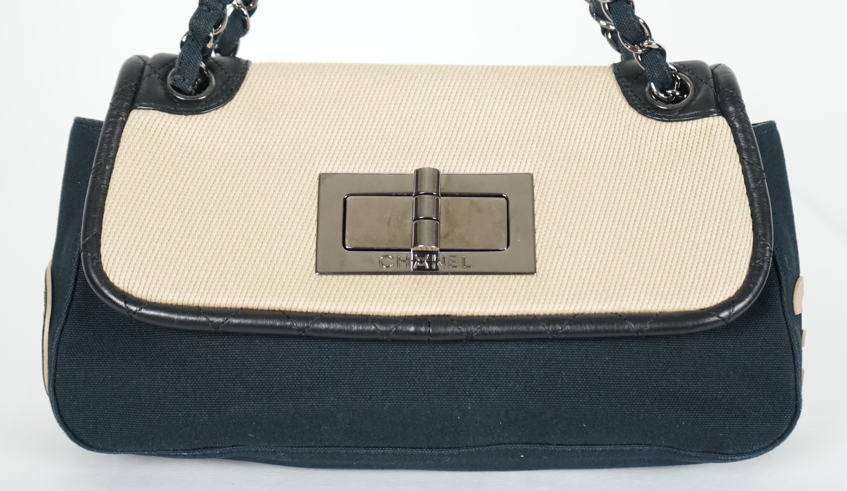 A Chanel No 5 Madamoiselle tri colour canvas and leather, chain shoulder handbag, with dust bag, width 29cm, height 16cm, overall height 35cm, depth 9cm, Please note this lot attracts an additional import tax of 20% on t